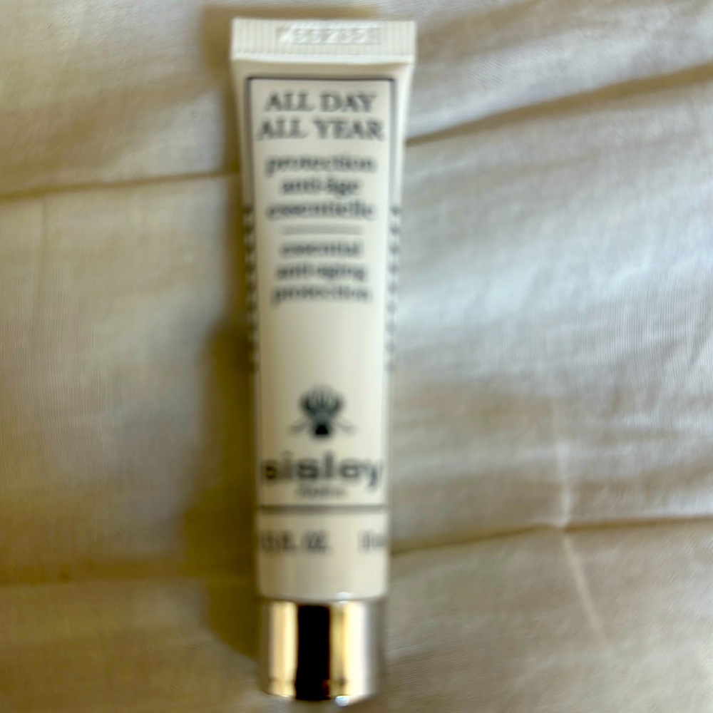 All day all year Sisley Paris cream. Great for travel .33 oz /10 ml. Offers !!